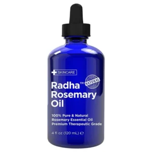Bottle of Radha Beauty rosemary essential oil for aromatherapy, scalp care, and hair growth